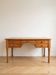 Large solid pine minister's desk with turned legs.