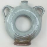 Vernified ceramic vase with handles