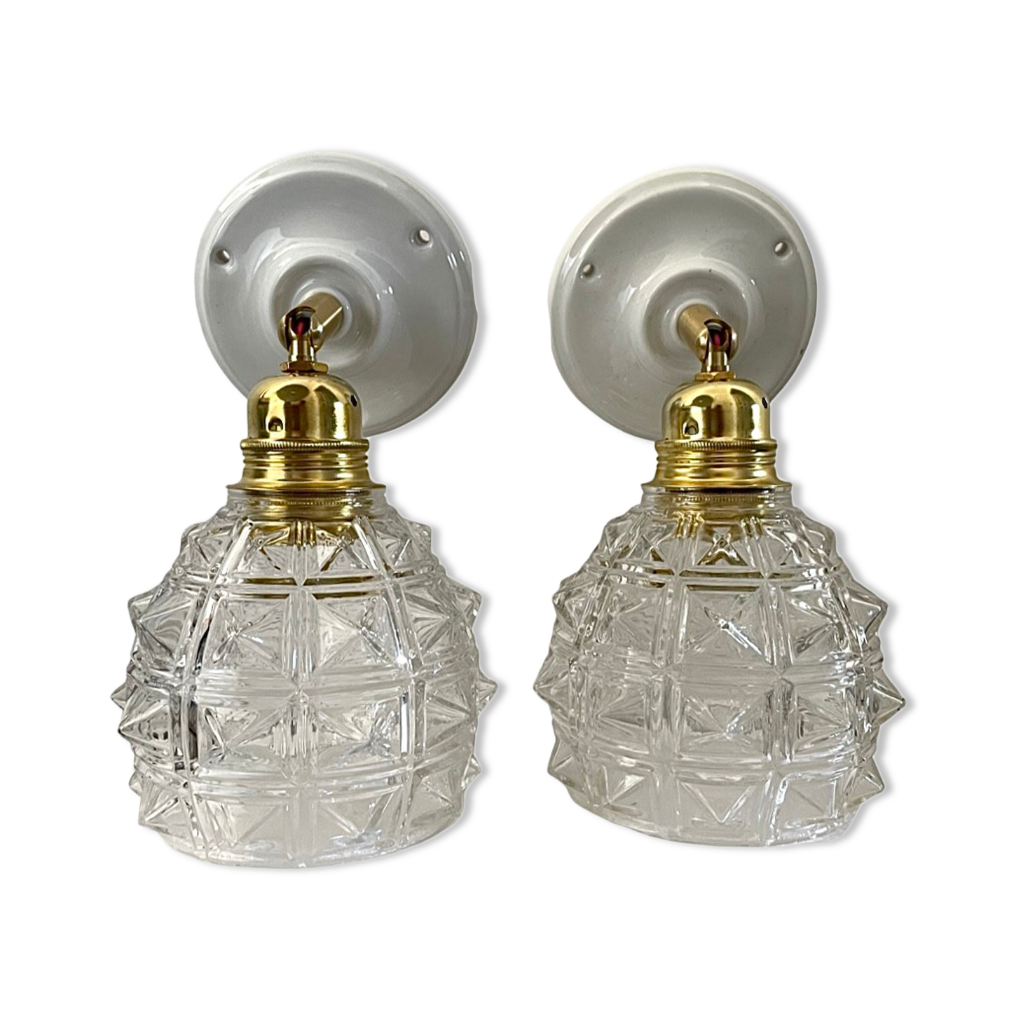 Pair of new electrified chiseled glass sconces