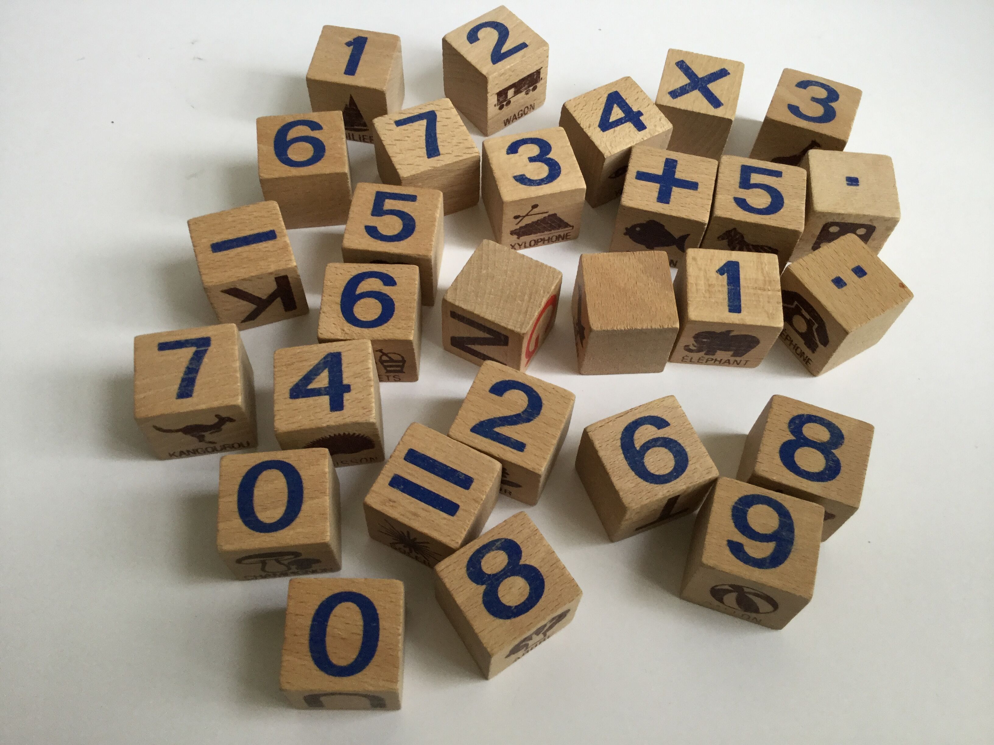 Ancient wooden toy cubes alphabet, figures and pictures