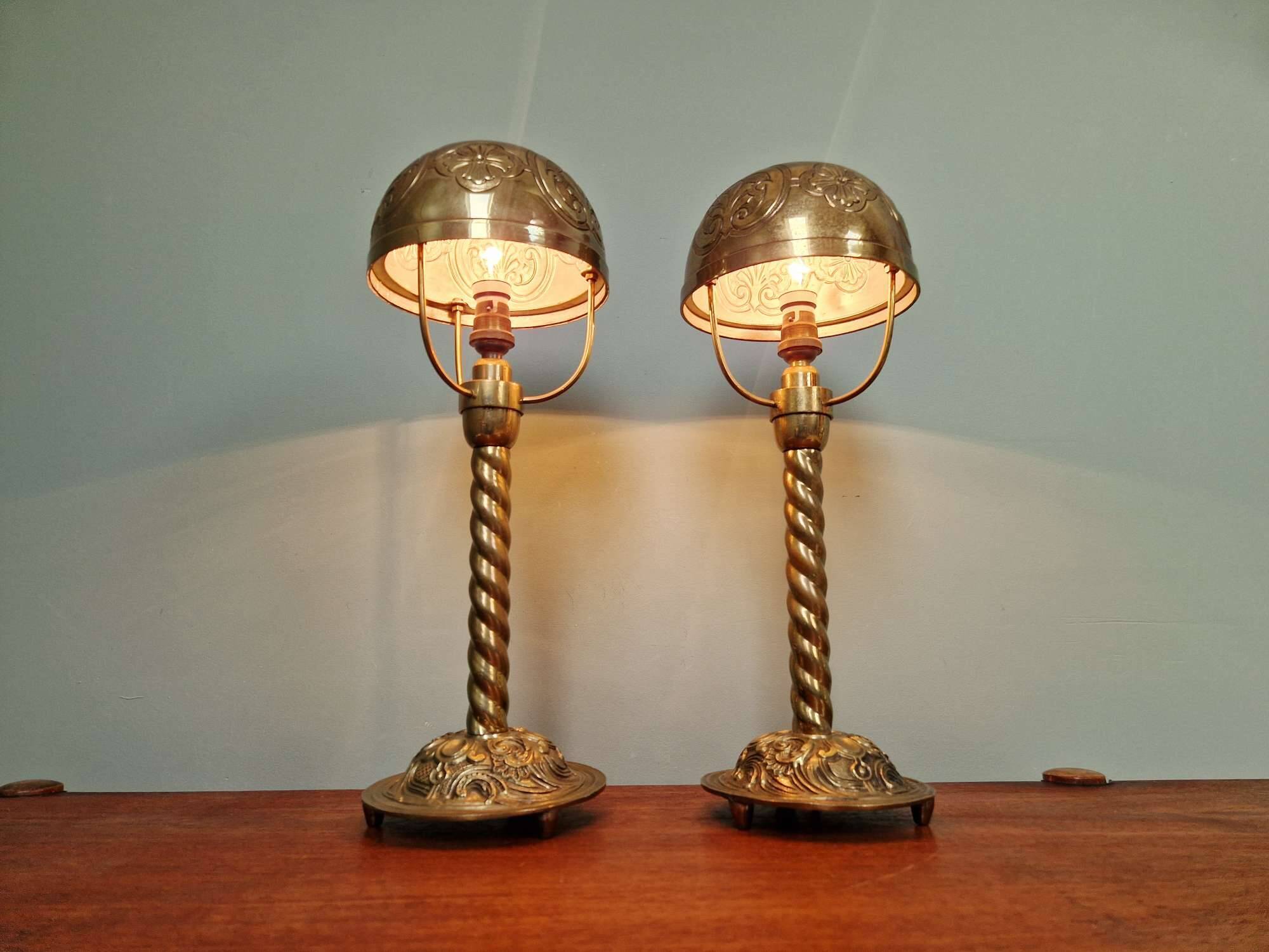 Pair of table lamps in bronze and brass, early 20th century.
