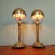 Pair of table lamps in bronze and brass, early 20th century.