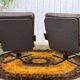 Pair of Norwegian swivel armchairs in leather and beech from the 1970s.