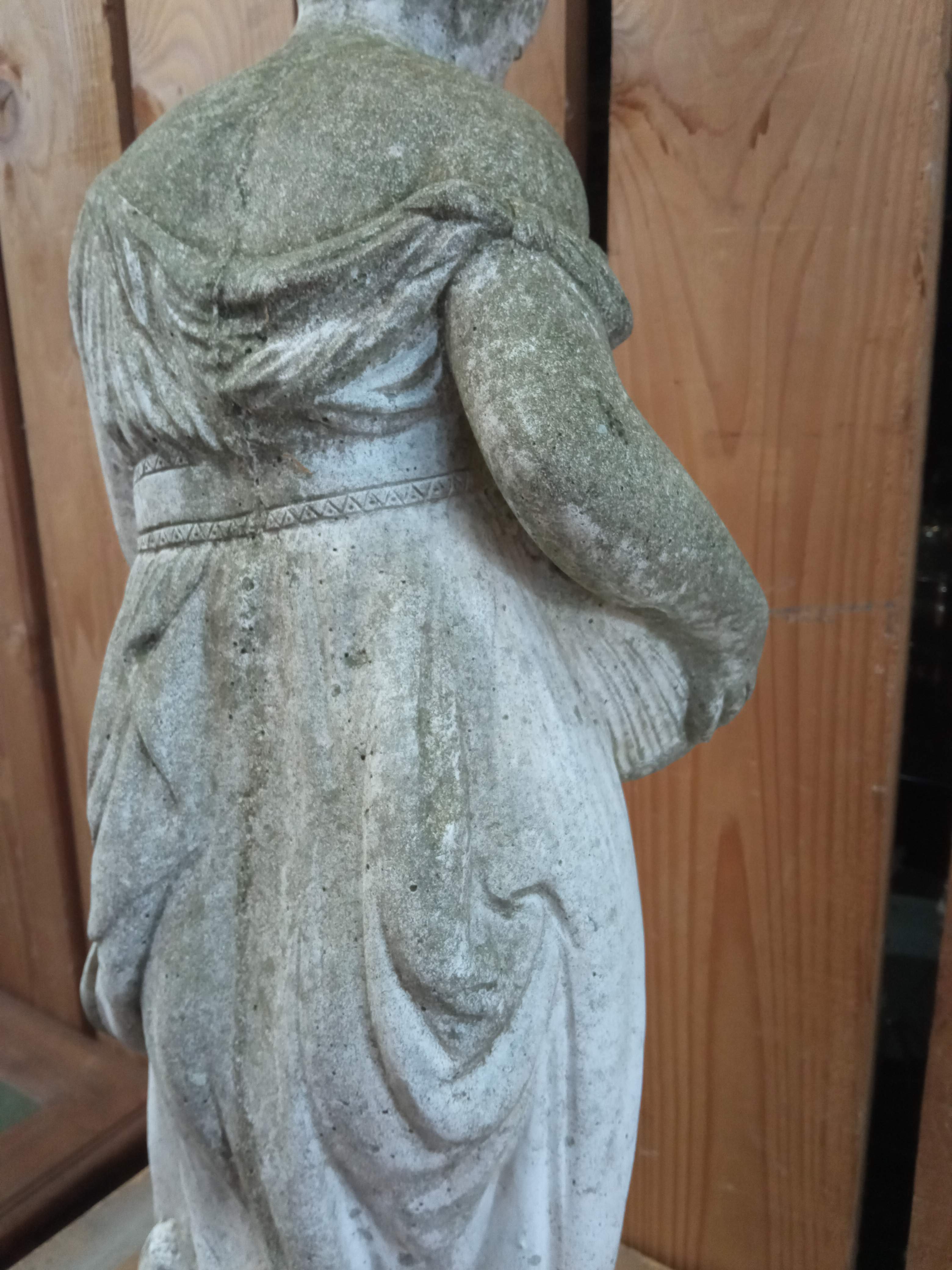 Reconstructed stone garden statue