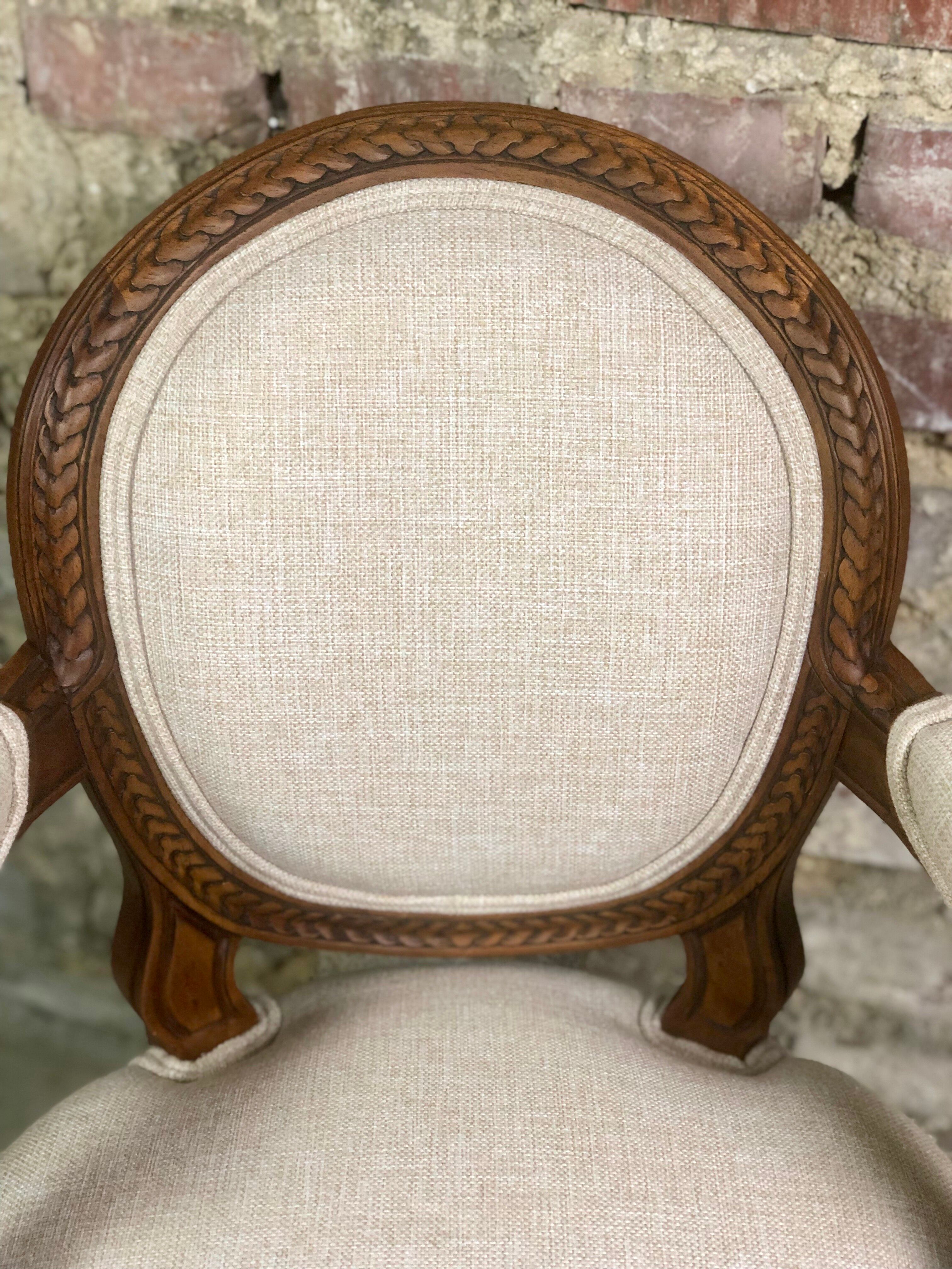 Louis XVI style children's armchair in carved walnut and beige antique upholstery