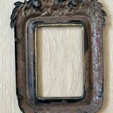 Black metal frame knot and laurel branch