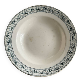 Very old hollow plate made of ironstone.