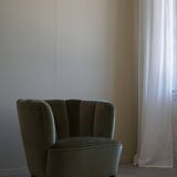 Curved Danish club chair from the mid-century, in the style of Viggo Boesen, 1940s.