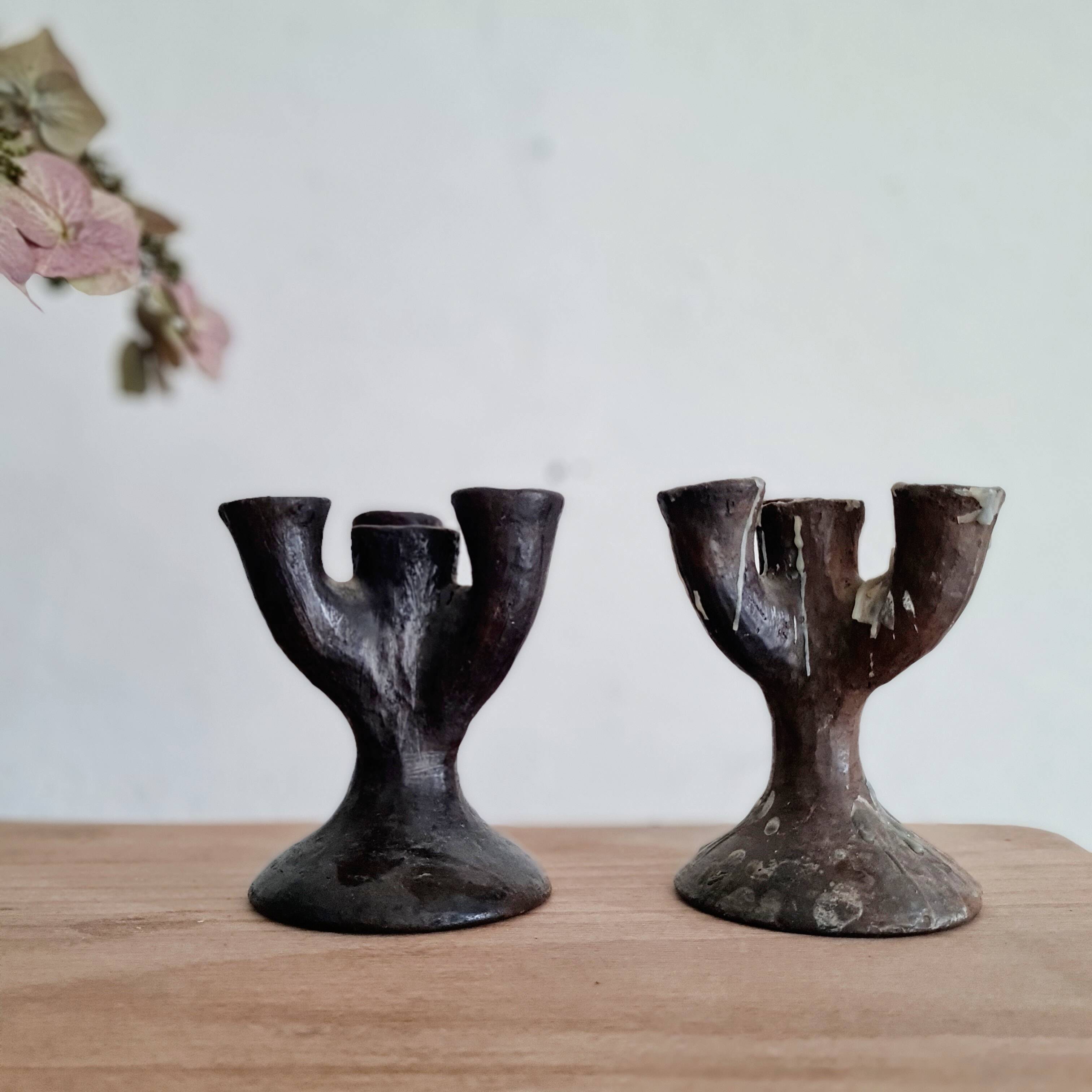 Antique terracotta candlesticks
