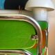 Série de 8 chaises Souvignet en chrome et skaï vert