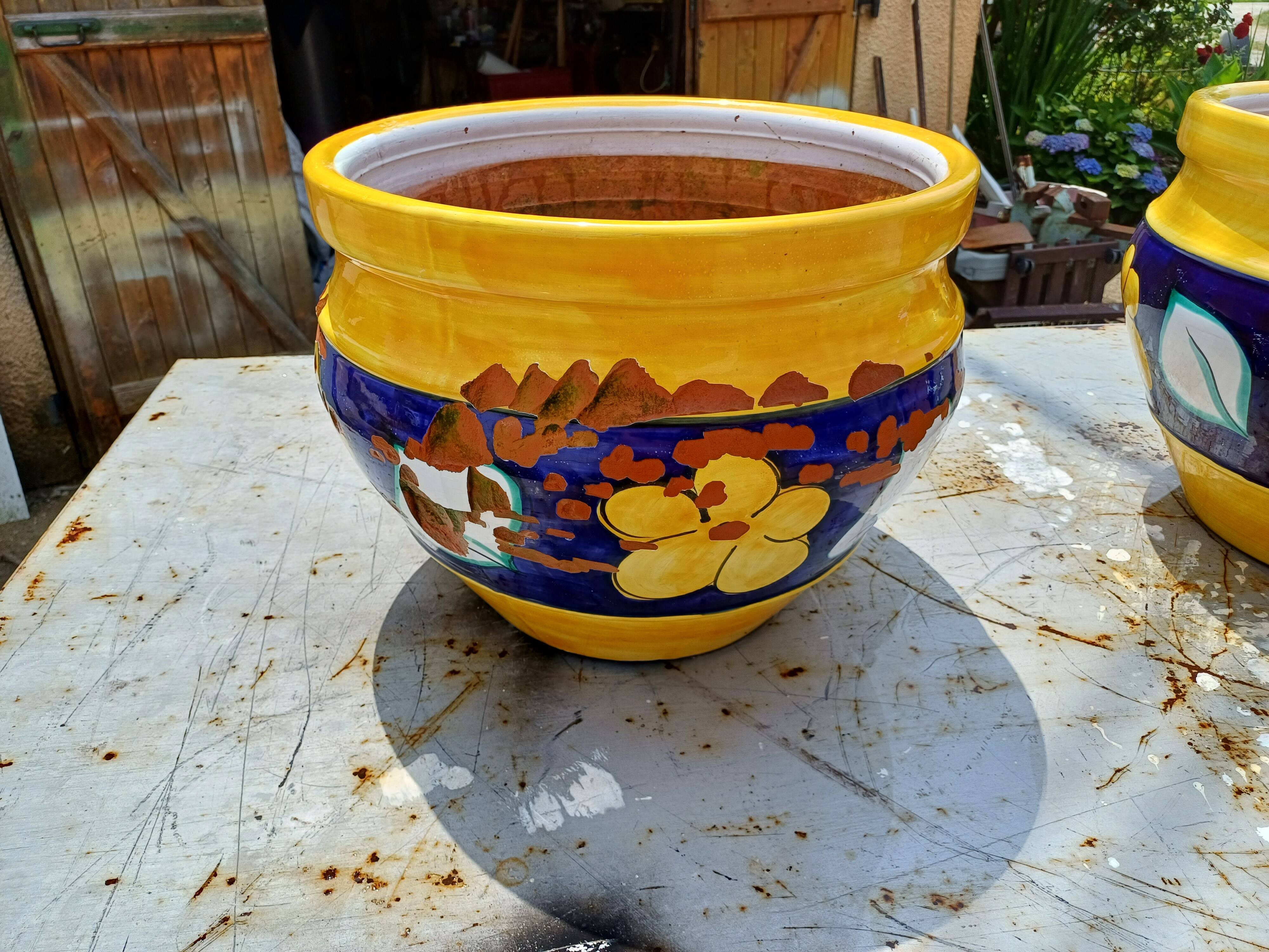 Pair of glazed terracotta planters