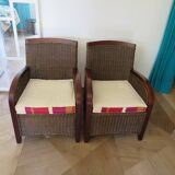2 armchairs in woven rattan and wood, 1980s