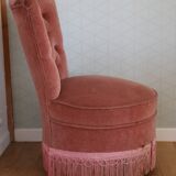 Powder pink fireside chair with fringes