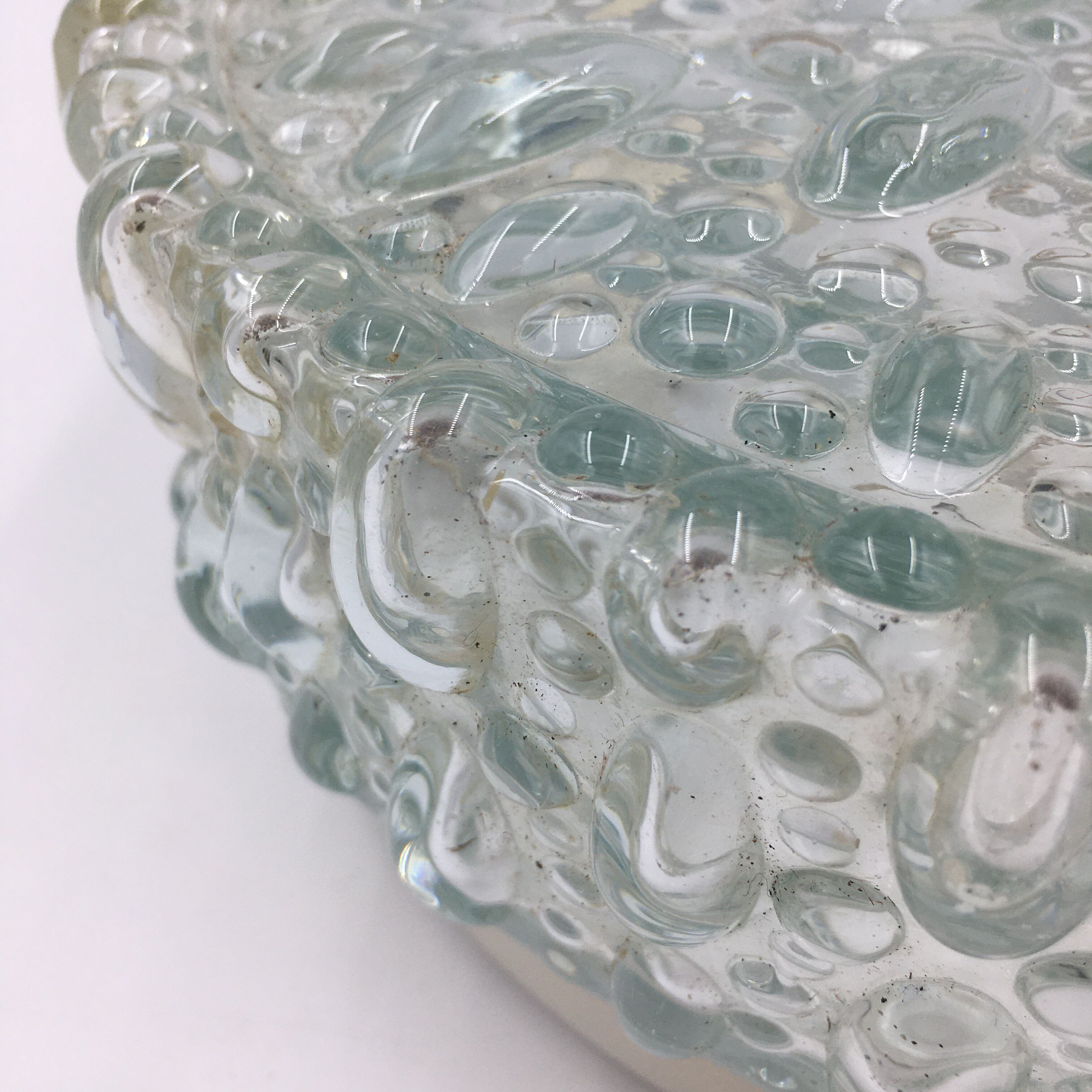 Round ceiling lamp in molded glass with relief