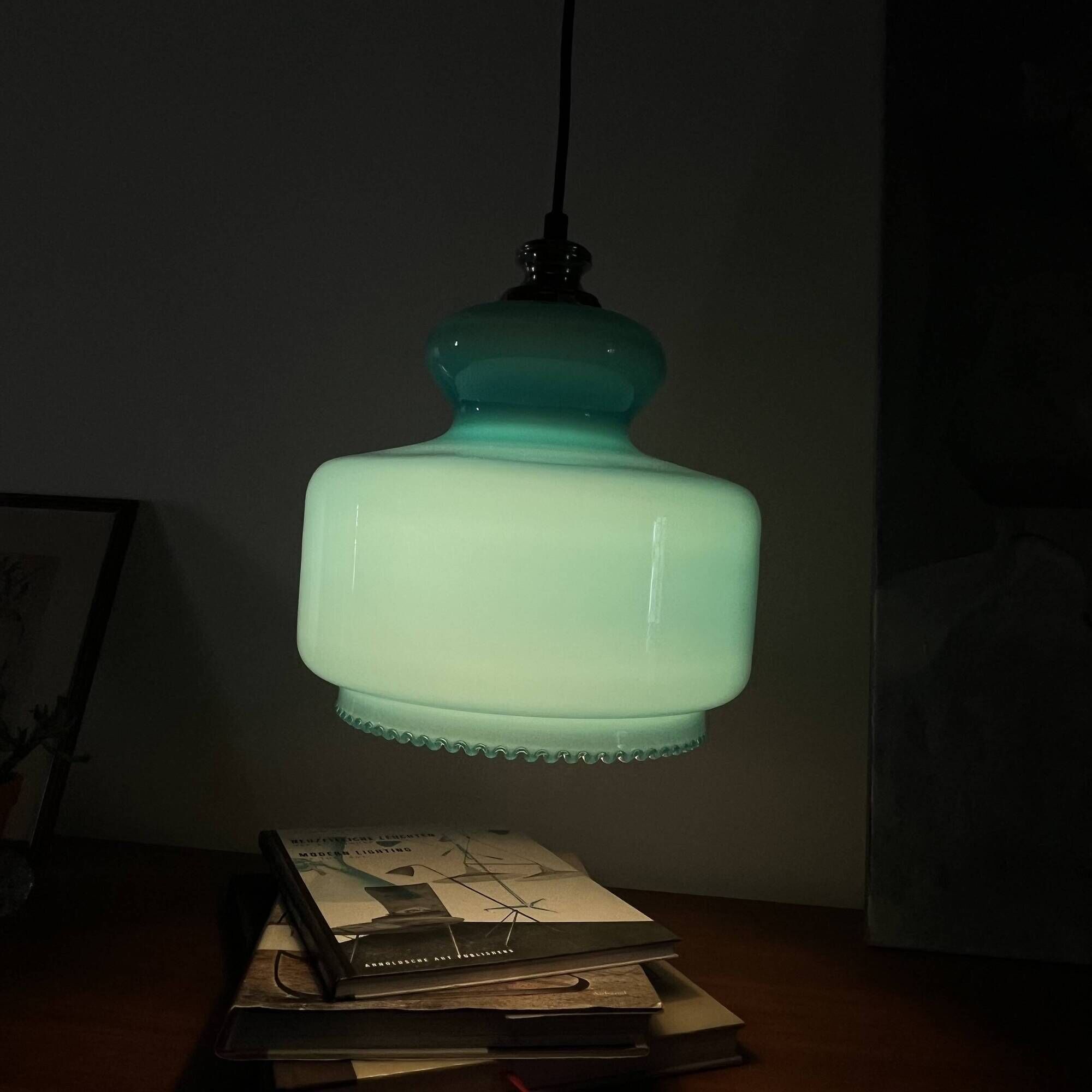 Suspension lustre globe in blue opaline glass from the 1970s.