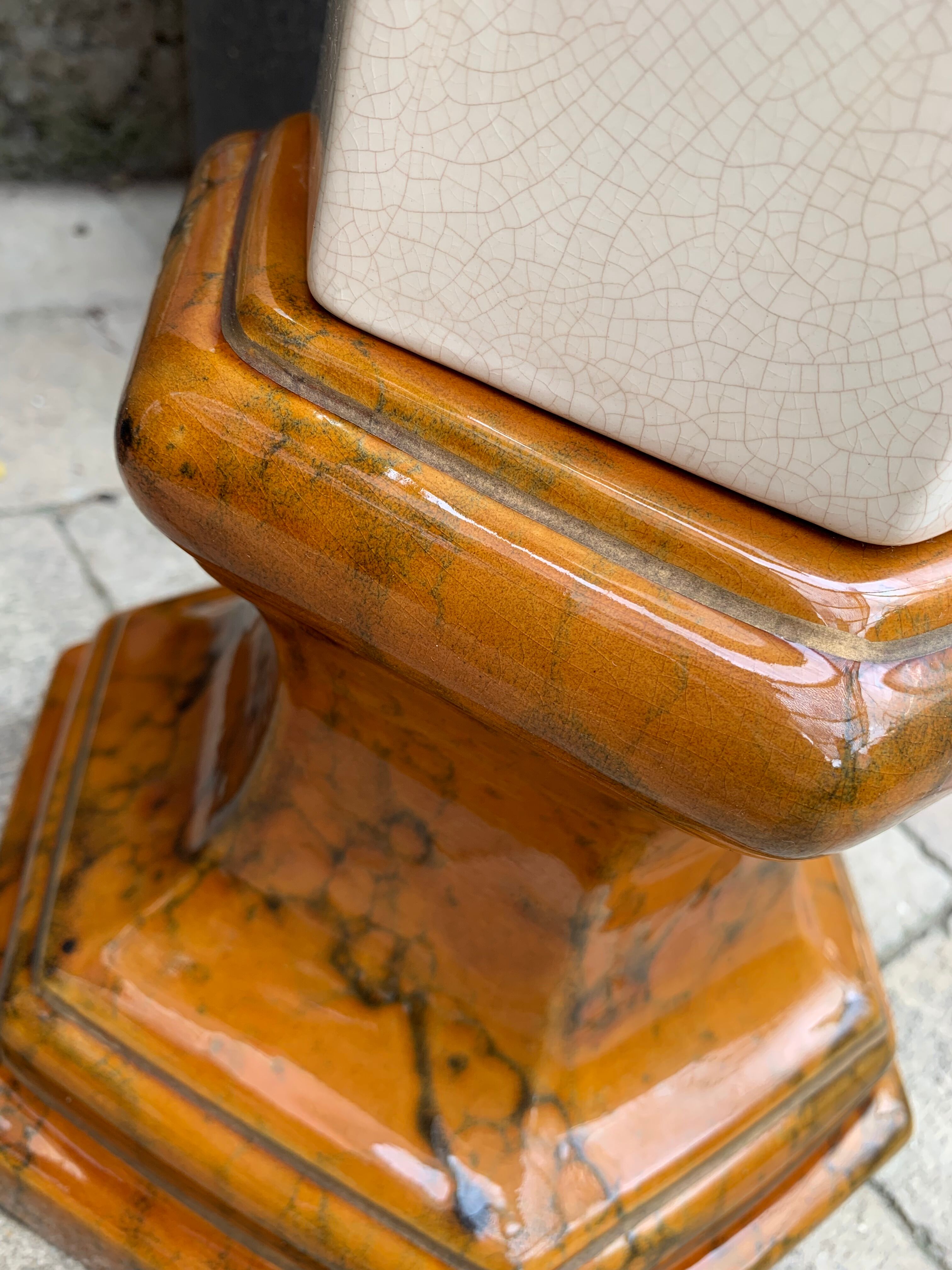 Column wears vintage plant