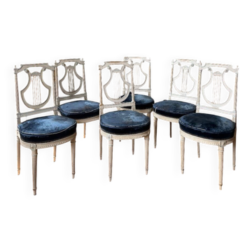 Set of 6 lyre chairs from the Napoleonic III period in painted wood in the Louis XVI style.