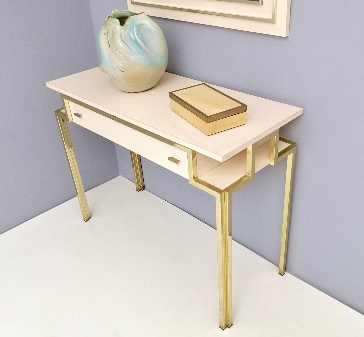 Postmodern pale pink formica and brass console with wall mirror, italy