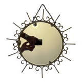 Miroir soleil en métal doré