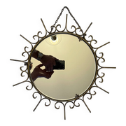 Miroir soleil en métal doré
