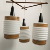 Scandinavian triangle pendant light in cascade with 3 opalines
