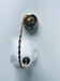 Flower suspension in glass paste