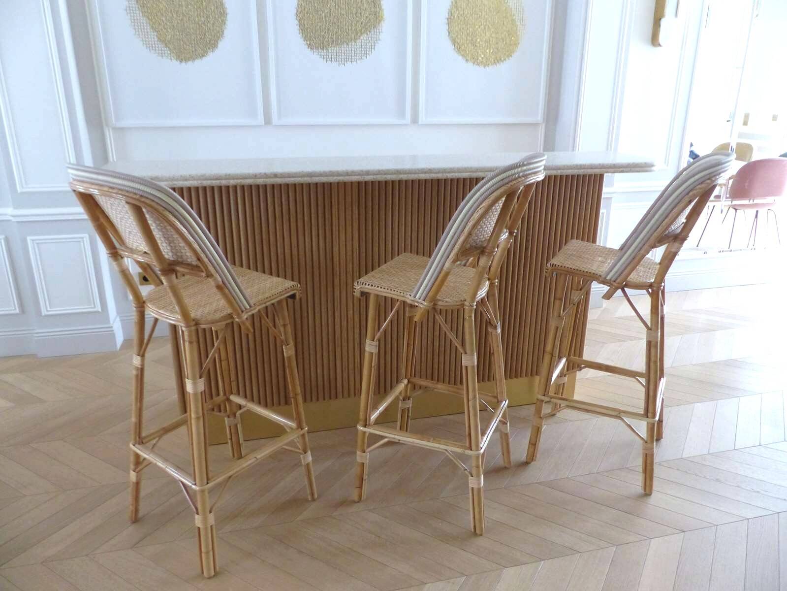 Lot of 3 Maison Louis Drucker light Manila rattan bistro high chairs.