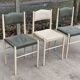 3 Scandinavian Baumann style chairs, steel and white and dark green crocodile leather