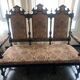 Historicist three-seater canapé in ebonised wood.