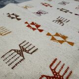 Handmade Berber patterned rug in natural wool