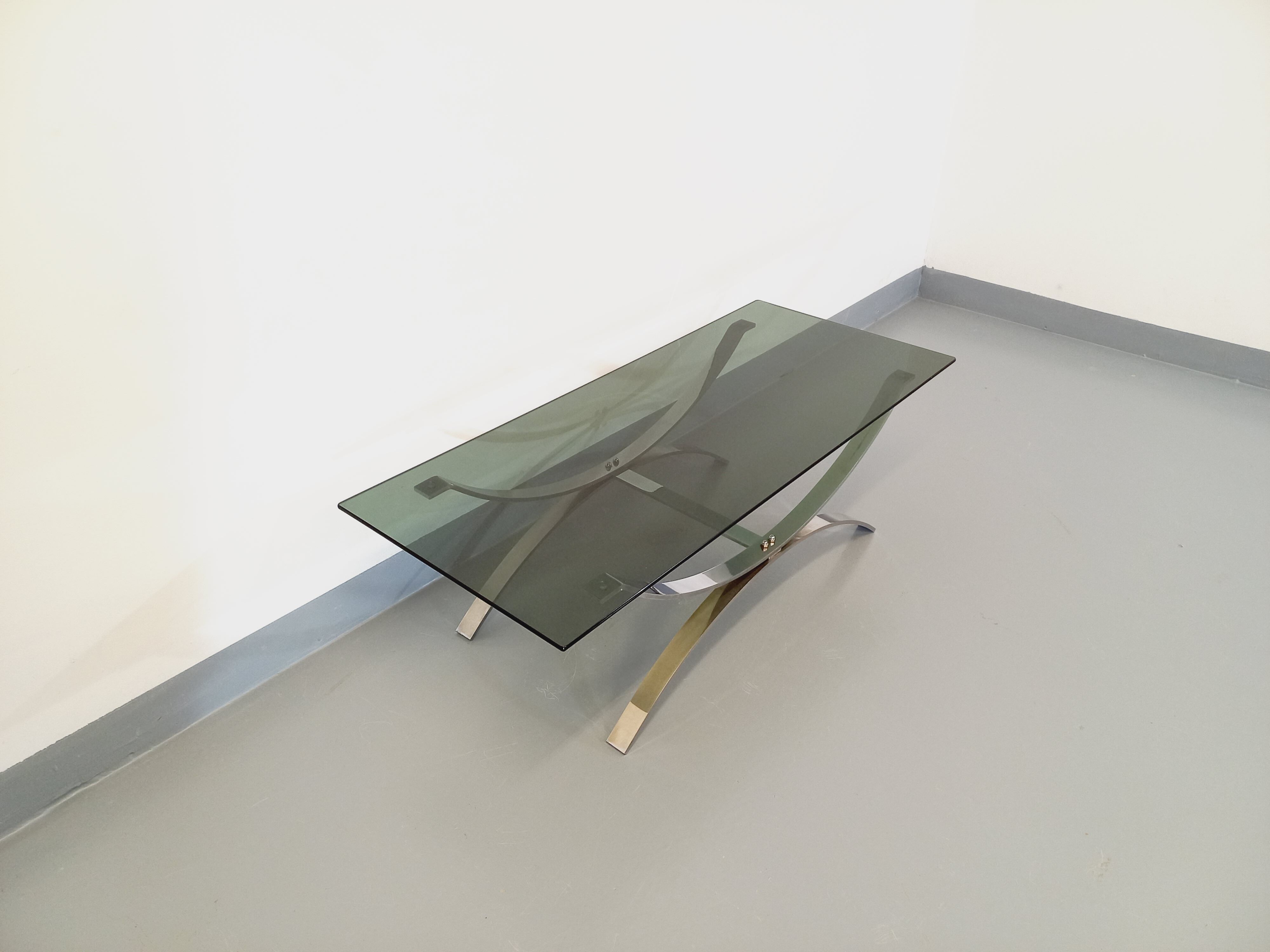 Vintage glass and chromed metal coffee table from the 70s
