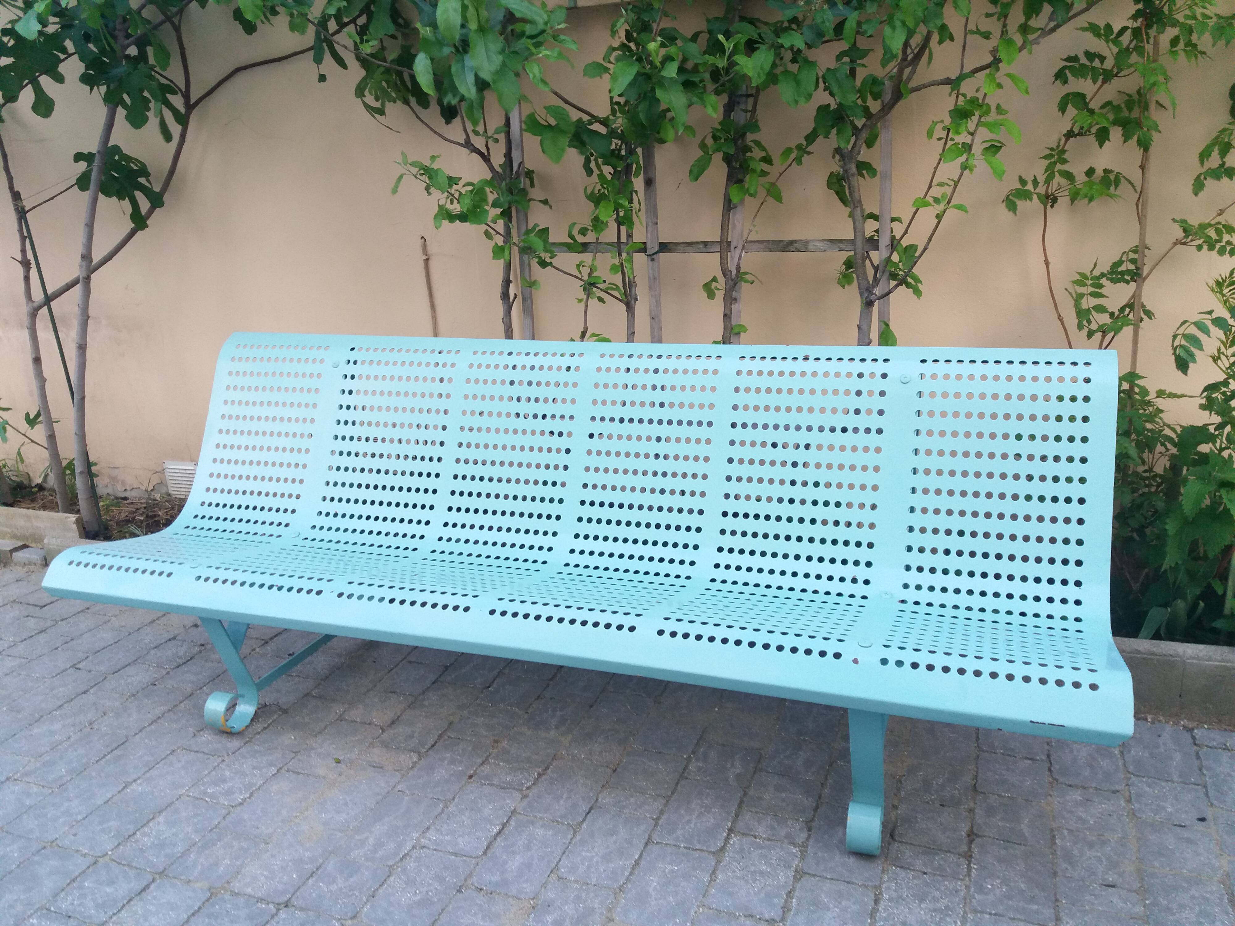 Vintage garden bench in metal