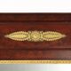 Antique Empire fireplace mirror in mahogany with a bronze frame, Italy, 19th century.