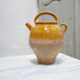 Old gargoulette pot in glazed terracotta