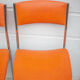 Paire de chaises métal chromé et skaï orange