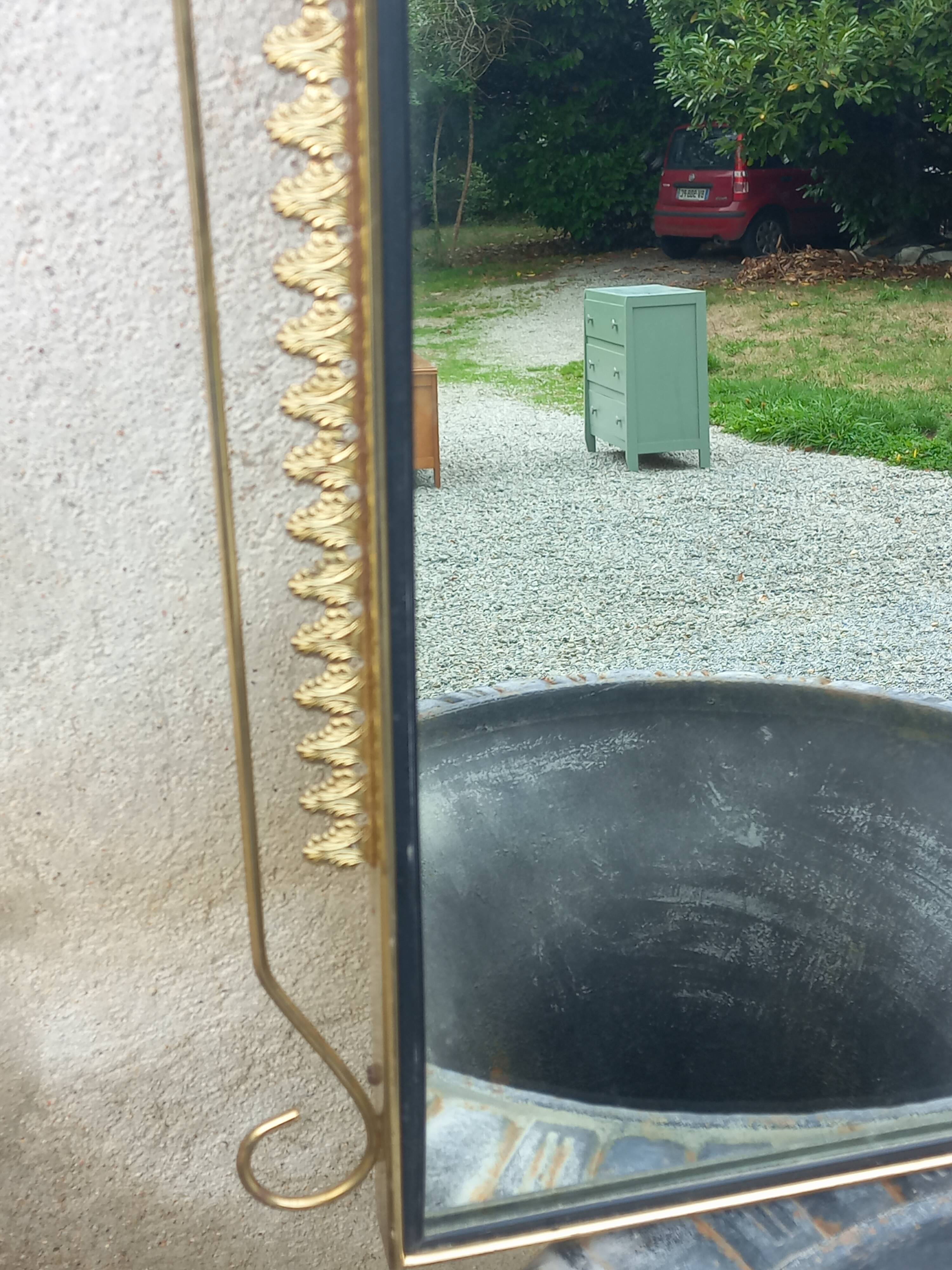 Vintage 1950s neoclassical style gold metal mirror