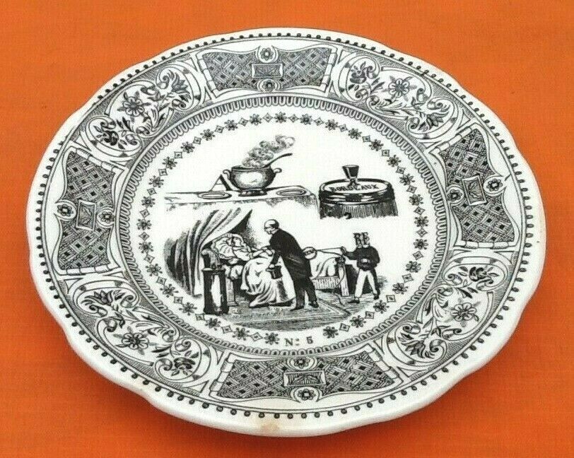 Plate " rebus " Faience of Gien After the soup a glass of wine removes a shield from the...