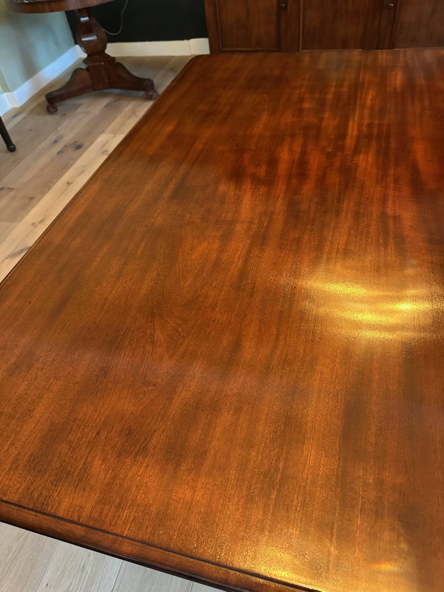 19th century almost square antique mahogany dining table.