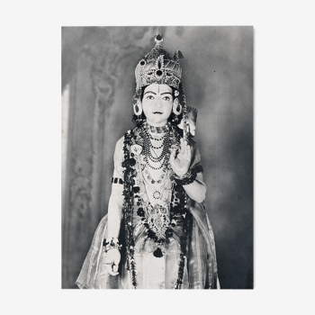 Photograph of a statue of Krishna adorned like an idol