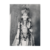Photograph of a statue of Krishna adorned like an idol