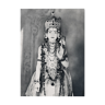 Photograph of a statue of Krishna adorned like an idol