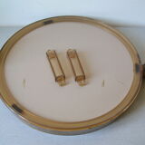 Old round mirror of the 1970s in glass and plexi
