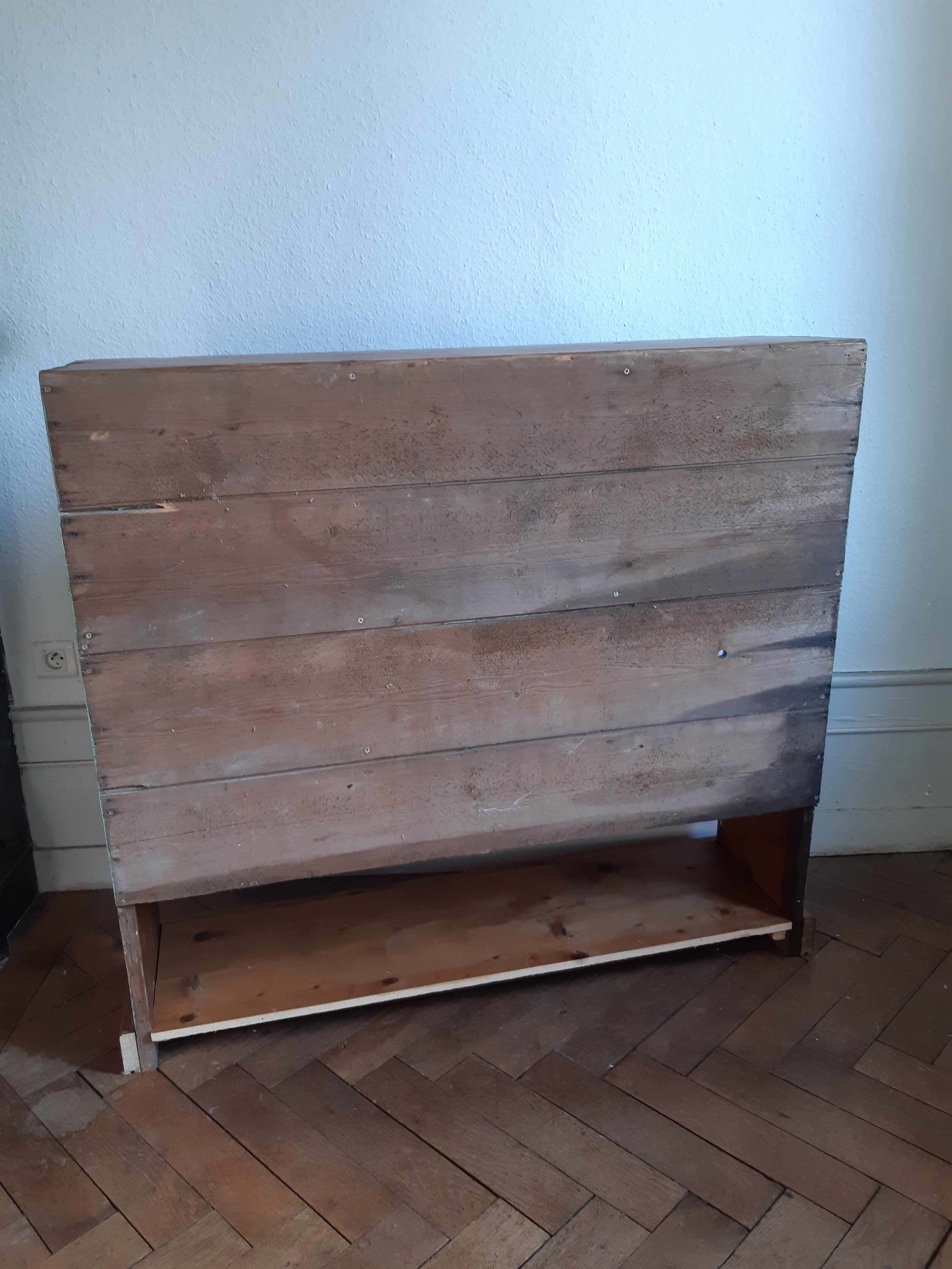 Old library shelf in patinated grocery tree