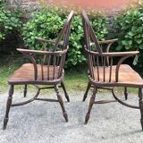 A pair of Windsor chairs in solid elm from the 1950s.