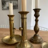 Set 4 vintage brass candlesticks patinated