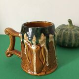 Polychrome ceramic beer mug with fat lava effect