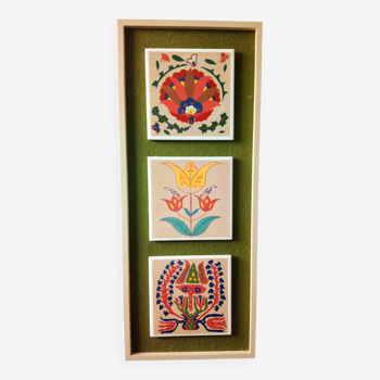 three framed vintage ceramic tiles, naive style