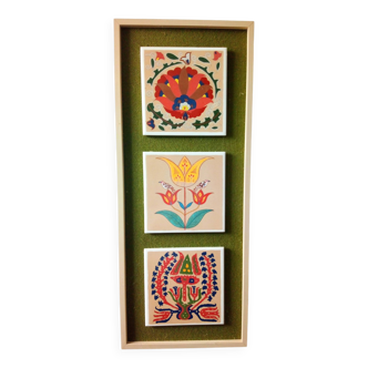 three framed vintage ceramic tiles, naive style