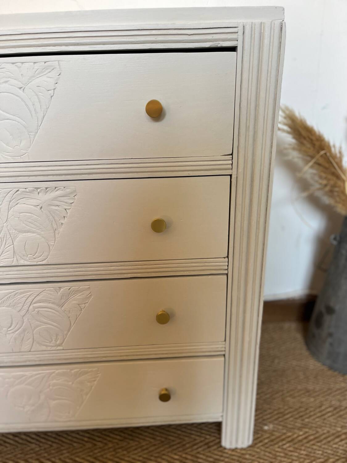 Restored wooden art deco chest of drawers with gilded handles