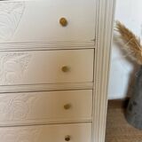 Restored wooden art deco chest of drawers with gilded handles